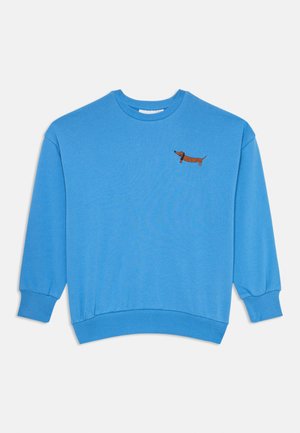 Light blue sweatshirt made of cotton, features a round neckline and ribbed cuffs, with a brown embroidered dachshund design on the chest.