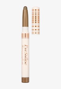 A cream eye shadow stick with a metallic bronze tip and a white body, featuring rose gold stripes, twist-up applicator, and a removable cap.