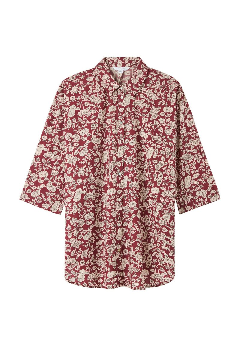 Camicia rossa a bottoni con motivo floreale bianco, maniche lunghe e colletto. Realizzata in tessuto leggero con una vestibilità rilassata.