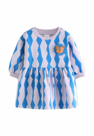 Kleid mit blau-weißer Zickzackmusterung, einem gerafften Rock und langen Ärmeln. Hat ein Löwengesicht-Patch auf der Brust. Aus weichem Stoff gefertigt.