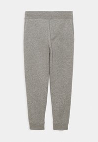 Ljusgrå tapered sweatpants med elastisk midja och manschetter vid anklarna, visade på ett platt underlag mot en vit bakgrund.