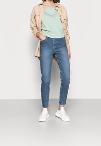 NA-KD Tall Relaxed fit -farkut - light blue