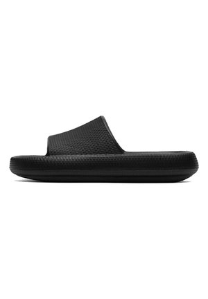 Black rubber slide sandal with a textured upper and cushioned sole. Open toe design. Simple, modern shape with a flat profile.