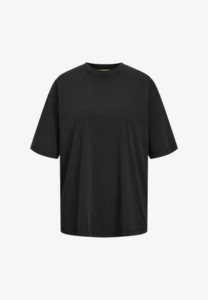 Czarna, oversize koszulka z bawełny, z okrągłym dekoltem i krótkimi rękawami. Gładka tekstura z minimalnymi detalami szycia.