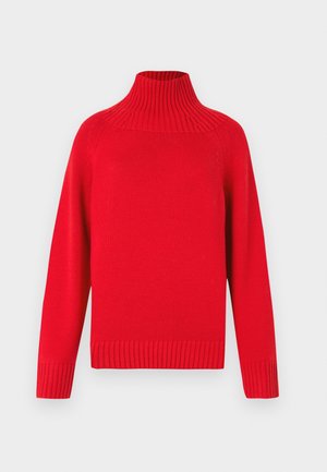 Raudonas megztinis aukštu kaklu, turintis gofruotą apykaklę ir apačią, su ilgomis rankovėmis ir laisvu fitu. Tekstūruota medžiaga su lygiu paviršiumi.