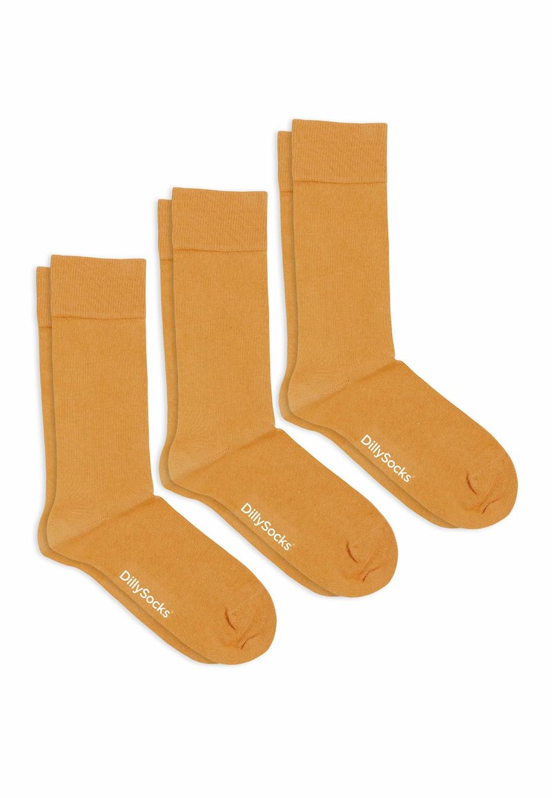 Trois paires de chaussettes montantes jaune moutarde avec le logo "DillySocks" imprimé près des orteils, disposées côte à côte sur un fond blanc.