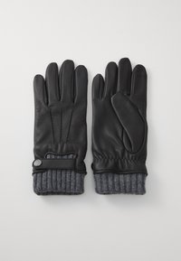 Black leather gloves with gray knitted cuffs, one glove showing front with button strap, the other showing palm side.