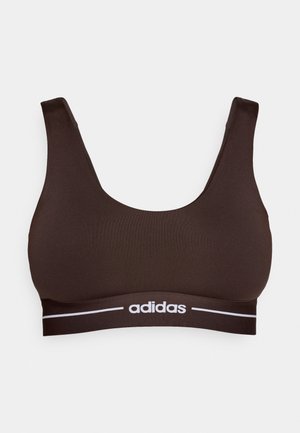 Brown sports bra made of smooth fabric with a wide band featuring white "adidas" logo. Simple design with wide straps and a rounded neckline.