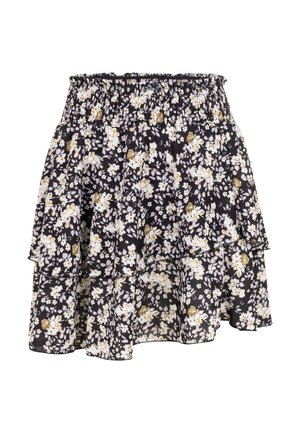 Jupe noire à volants avec imprimé floral blanc et beige et ceinture élastique.