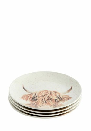 Stack of four white plates with a painted image of a long-haired horned animal's face on the top plate.