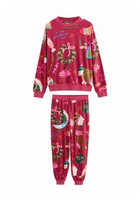 Red Christmas-themed sweatshirt and pants set with wreaths, stockings, polar bears, drinks, and festive text patterns.