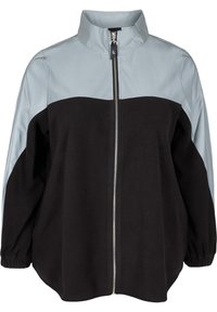 Veste zippée noire et bleu clair avec un col haut. Tissu doux, design bicolore et poignets élastiques. Texture lisse et coupe décontractée.