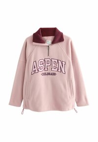 Világos rózsaszín fleecpulóver bordó gallérral, amelyen fehér színnel az "ASPEN COLORADO" felirat található, oldalsó zsebbel és állítható derékkal.