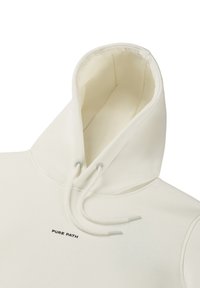 Crèmekleurige hoodie van zachte stof. Voorzien van een trekkoordhoed, een voorzijde met het logo "PURE PATH" en een ontspannen, gestroomlijnd ontwerp.