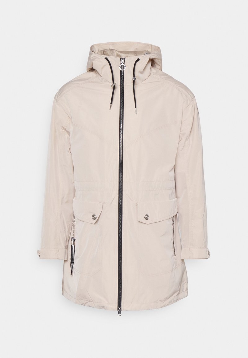 Ljusbeige vattentålig jacka med dragkedja fram, justerbar huva, två framfickor och svarta detaljer på dragkedjan och snoddarna.
