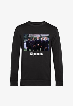 Pięciu mężczyzn w ciemnych garniturach stojących na cmentarzu, z napisem "The Sopranos" poniżej, na czarnej koszulce z długim rękawem.