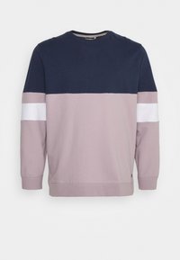 Sweat-shirt à col rond manches longues avec le haut bleu marine, le bas mauve, et une bande horizontale blanche sur les deux manches.