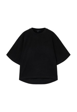 Zwarte oversized T-shirt met korte mouwen, ronde halslijn en een gebogen zoom. Gemaakt van gestructureerde stof, ontworpen voor een ontspannen pasvorm.