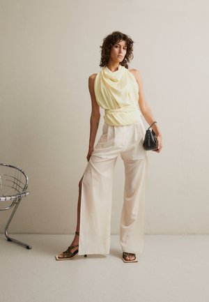 WIDE LEG PANTS WITH SEE THROUGH BOTTOM - Trousers - light peach