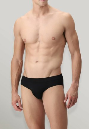 Slip neri da uomo con una superficie liscia e una vita elastica, caratterizzati da un design minimalista senza fantasie o parti metalliche a vista.