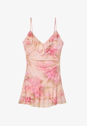 Floral-printed dress in soft pink and cream, featuring a ruffled neckline, adjustable straps, and a flared hem with pleats.
