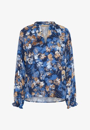 Modra cvetlična bluza z dolgimi rokavi, nabrani manšeti in obliko V. Značilna je mešanica modrih, belih in rjavih cvetličnih vzorcev na mornarsko modri podlagi.