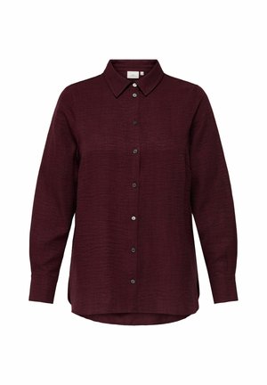 Burgundská košile s dlouhým rukávem, zapínáním na knoflíky, standardním límcem a strukturovanou tkaninou. Má černé knoflíky a zakřivený lem.