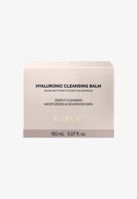 Boîte de baume nettoyant hyaluronique, beige clair avec du texte doré, présente le nom et les détails du produit, volume de 150 mL, design moderne et épuré.