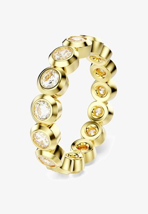 Bague en or présentant plusieurs sertissages circulaires avec des pierres précieuses claires et de couleur champagne, affichant une surface lisse et polie ainsi qu'un design homogène.