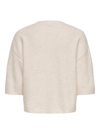 Pull en tricot beige à manches courtes avec un col rond et une coupe décontractée, vu de dos.