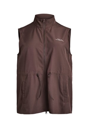 Brūna bezroku veste ar augstu apkakli, priekšā rāvējslēdzēju, divām sānu kabatām un auklas jostu viduklī. Ir balts logotips uz krūtīm.