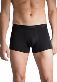 Black boxer shorts with a smooth texture, featuring a wide waistband printed with "JOOP!" in a contrasting color.