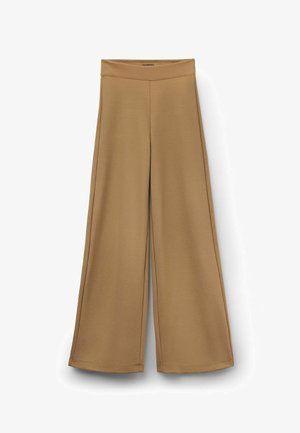 Bredde bukser i en varm beige stof med en glat tekstur. Har en flad talje og rene kanter, velegnet til afslappet brug.