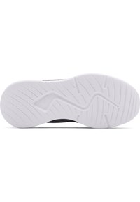 Suela de zapatilla negra con un diseño de goma blanca texturizado, que presenta un patrón de olas y surcos para mayor tracción. Material ligeramente acolchado y flexible.