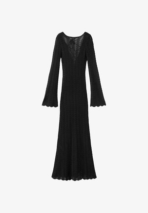 Schwarzes langärmliges Strickkleid mit wellenförmigen Kanten, ausgestellten Ärmeln und tiefem V-Ausschnitt, der hinten mit einer kleinen Schleife gebunden ist.