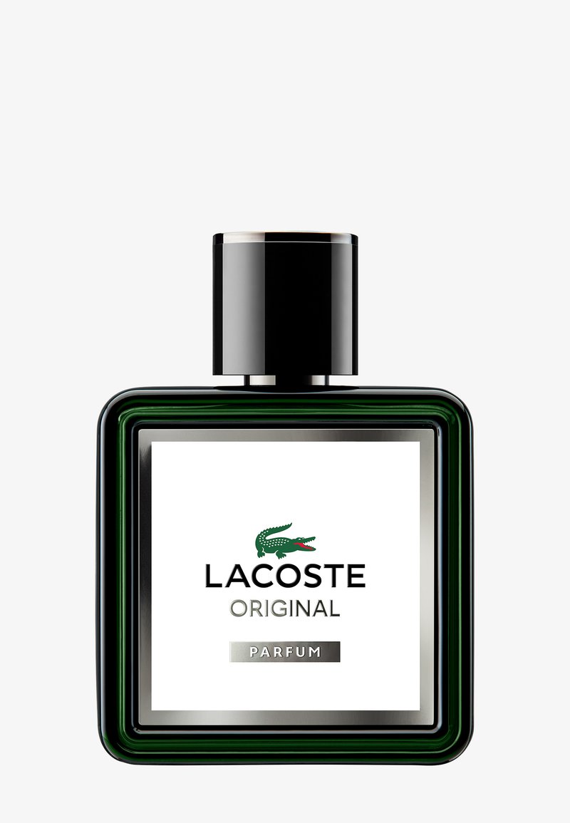 Parfum Lacoste Original dans un flacon en verre carré avec un dégradé vert, un bouchon noir, des accents argentés et une étiquette blanche avec le logo et le texte.