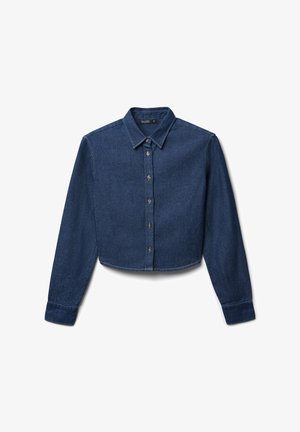 Camicia di jeans cropped in blu scuro. Presenta un colletto, chiusura con bottoni sul davanti, maniche lunghe e dettagli cuciti lungo l'orlo e le cuciture.