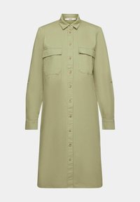 Robe-chemise vert olive à manches longues avec col, boutonnage devant et deux poches poitrine à rabat.