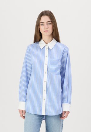 Blue and white striped shirt with a white collar, button front, and a chest pocket. Long sleeves with white cuffs.