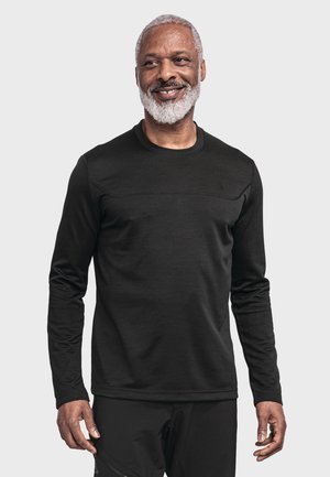 Schwarzes Langarmshirt aus strukturiertem Stoff, mit Rundhalsausschnitt, einer dezenten horizontalen Naht über der Brust und minimalem Branding.