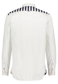 Camicia a maniche lunghe a righe in cotone bianco con righe blu scuro sulle spalle; presenta polsini con bottoni e spacchi laterali all'orlo.