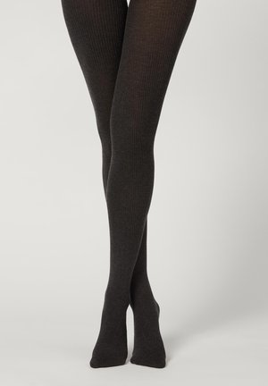 Zwarte geribde panty’s met een zachte textuur, tot halverwege de dij. Heeft een aansluitend ontwerp, een naadloze teen en een elastische tailleband voor comfort.