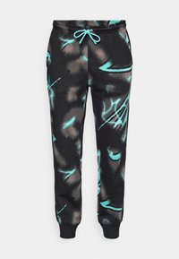 Sorte sweatpants med et abstrakt mønster i teal- og brune nuancer, med elastisk talje, snoretræk og tapered ben.