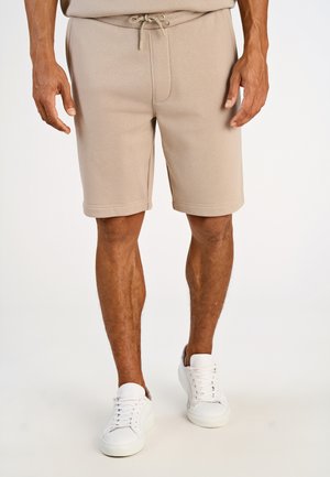Beige Shorts aus Baumwollmischung mit elastischem Bund und Kordelzug. Glatte Textur, knielang, mit zwei Seitentaschen.