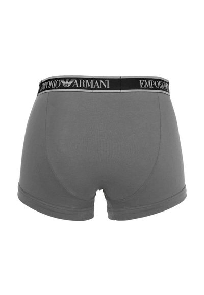 Γκρι ανδρικό μπόξερ με μαύρη ελαστική μέση που φέρει λευκό λογότυπο Emporio Armani και σύμβολο αετού, εμφανιζόμενο από πίσω.
