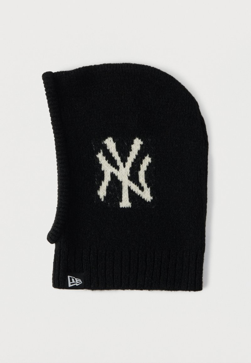 Black knitted beanie with a white NY logo, ribbed texture, and a folded edge. Features a small black brand tag at the bottom.