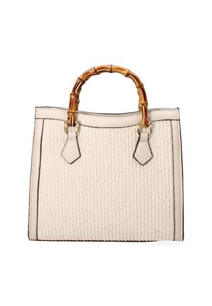 Woven beige handbag with bamboo handles, contrasting black trim, and decorative hardware details. Structured rectangular shape.