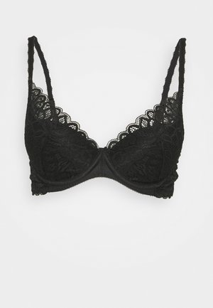 Czarny koronkowy stanik z falbany i dekoracyjnymi wzorami kwiatowymi. Posiada regulowane ramiączka i fiszbiny dla wsparcia.