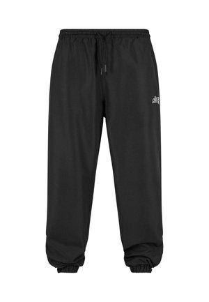 Black jogger pants with an elastic waistband and drawstring. Cuffs are fitted. Featured logo on the left thigh. Made from soft fabric.