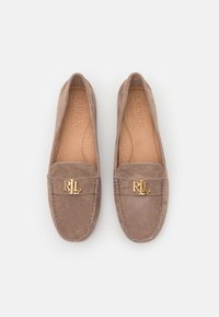 Pair of taupe suede loafers with gold "RL" logo hardware and tan leather insoles, viewed from above on a white background.